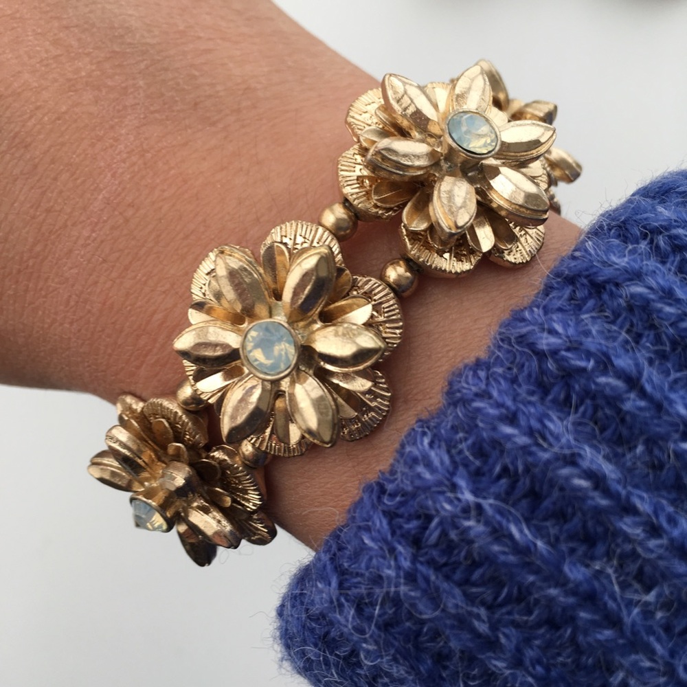Detailed Gold Flowers Bracelet with Crystal Center